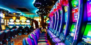 slot machines lined up at a casino slot machines lined up at a casino