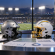 Editorial illustration of NFL betting analysis, Raiders and Chargers helmets, and matchup statistics