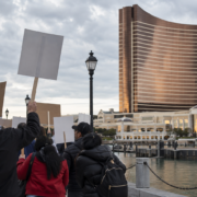 Editorial illustration for Encore Boston Harbor Strike Reaches Day 40 as Contract Talks Continue