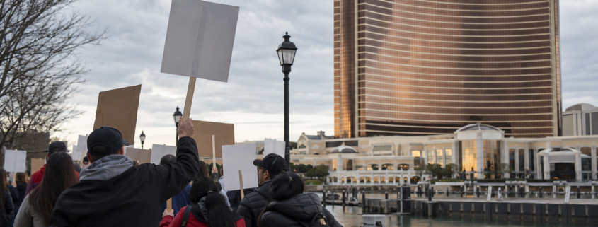 Editorial illustration for Encore Boston Harbor Strike Reaches Day 40 as Contract Talks Continue